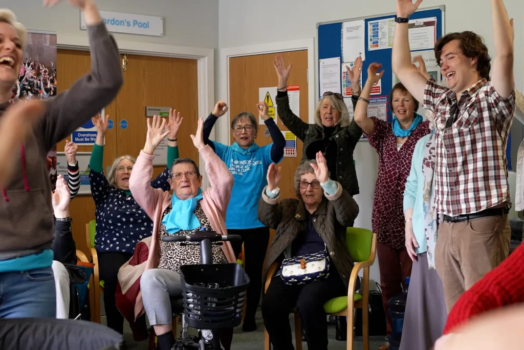 a group of people celebrating with joy
